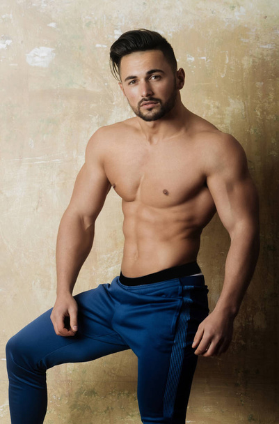 man or muscular athlete posing with sexy fit torso - Fotó, kép
