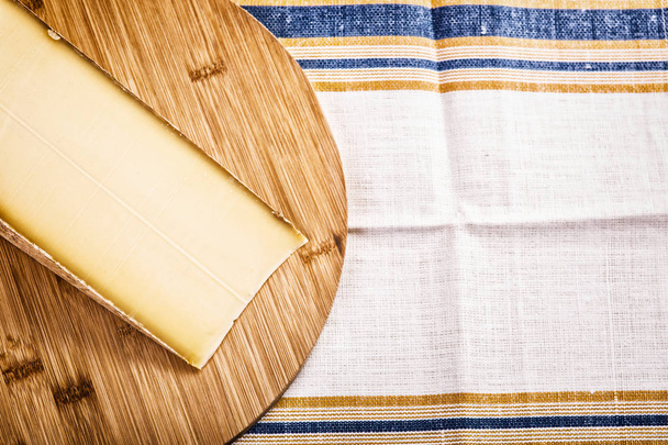slice of a french cheese Comte - Φωτογραφία, εικόνα