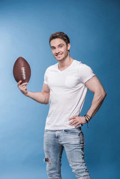 Young man with rugby ball  - Photo, Image