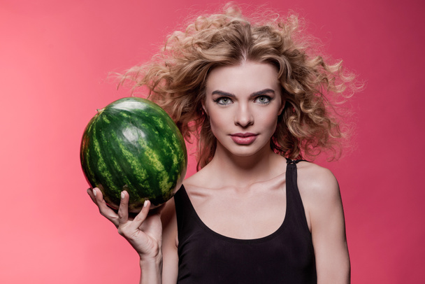 woman holding fresh watermelon - Fotó, kép