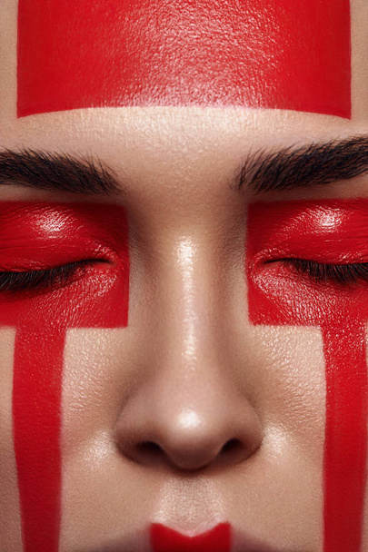 Beauty Woman with red Forms on Face - Photo, image