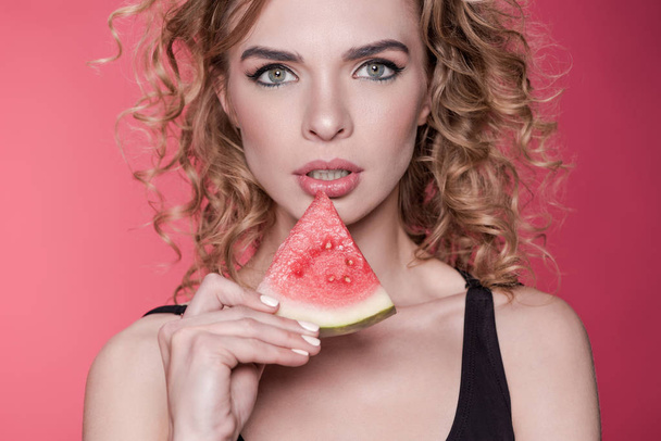 woman holding fresh watermelon - Фото, зображення