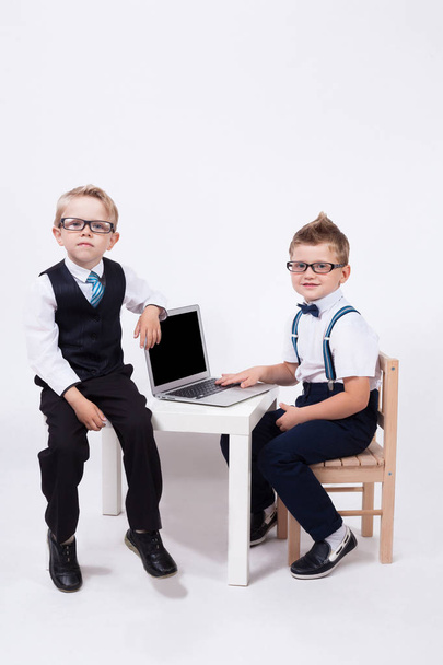 School boys working on laptop - Фото, изображение