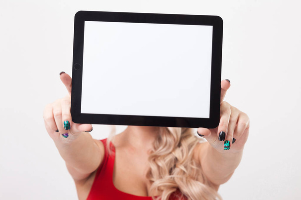 Woman in red dress with tablet in hands - Foto, immagini