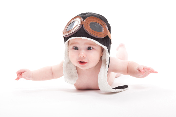 lindo bebé niño en piloto gorra
 - Foto, imagen