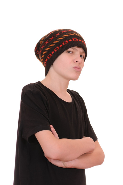 The teenager in a black vest and a hat - Фото, зображення