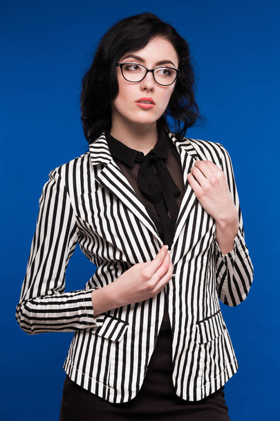girl in striped jacket and glasses - Zdjęcie, obraz