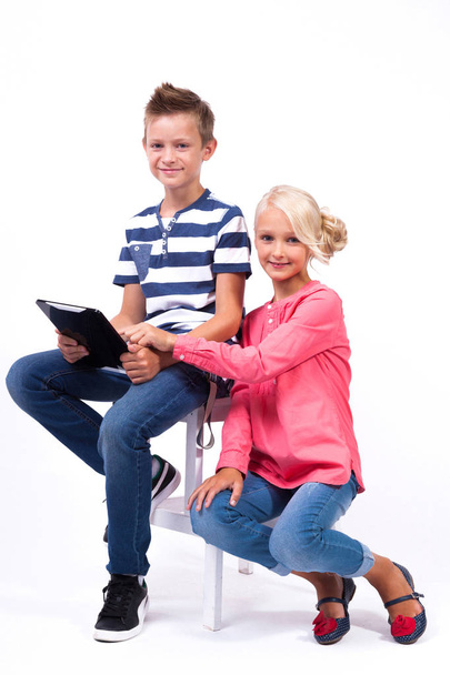 schoolchildren with modern tablet - Foto, afbeelding