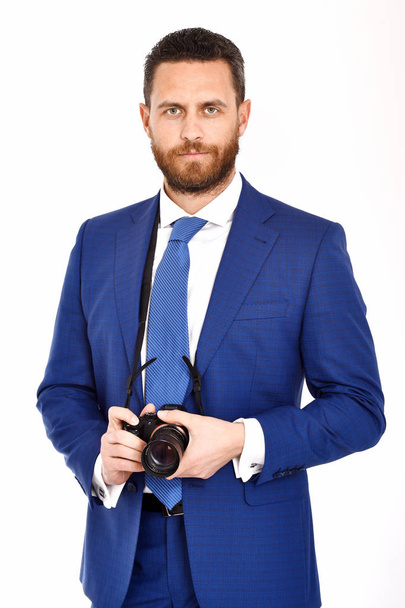 man or serious businessman with photo camera, photographer, journalist - Zdjęcie, obraz