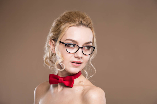 Young girl with bow tie and glasses - Fotografie, Obrázek