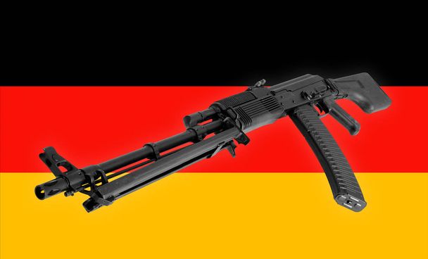 Fegyver - Assault rifle Németország lobogója háttér - Fotó, kép