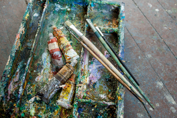 paint brushes in dirty box  - Fotó, kép