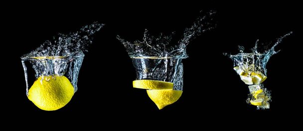 Composizione di tre limoni che cadono in acqua primo piano, macro, spruzzi d'acqua, bolle, isolate, fondo nero. Grandi grandi dimensioni
. - Foto, immagini