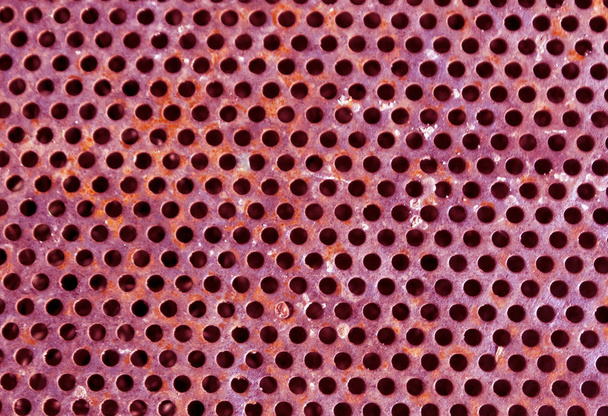 Vaaleanpunainen väri rei 'itetty metalli lattiakuvio
.  - Valokuva, kuva