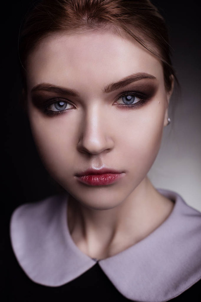 Portrait of girl with make up in studio  - Фото, изображение