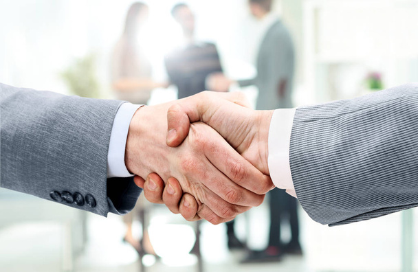 businessman shaking hands to seal a deal with his partner - Foto, Imagem