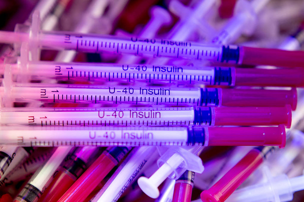 Syringes on colorful background unfocused - Foto, immagini
