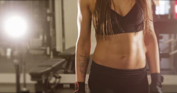Cinematic body portrait of active fitness womans waist and well trained stomach - Footage, Video