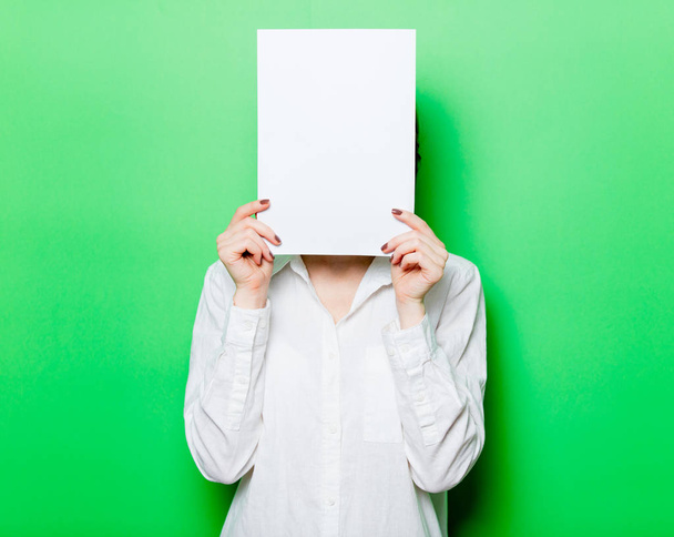 young woman with blank sheet - Photo, Image