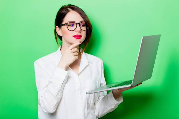 young woman holding laptop - Photo, image