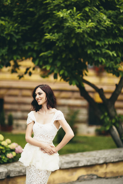 Young woman in white dress  - Zdjęcie, obraz