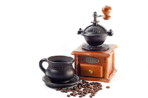 Black coffee cup with coffee grinder - Photo, Image