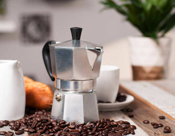Italian coffee maker for espresso on table - Фото, изображение