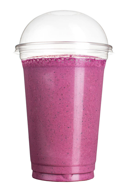 Take-away drink. Refreshing drink in a plastic cup. Berry smoothie. - Zdjęcie, obraz
