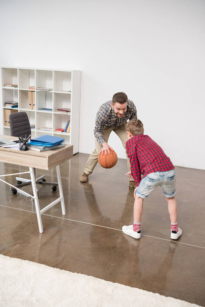 Businessman with son at home office - Foto, Imagem