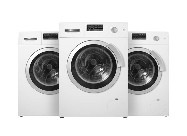 Household appliances - Three washing machines. Isolated - Zdjęcie, obraz