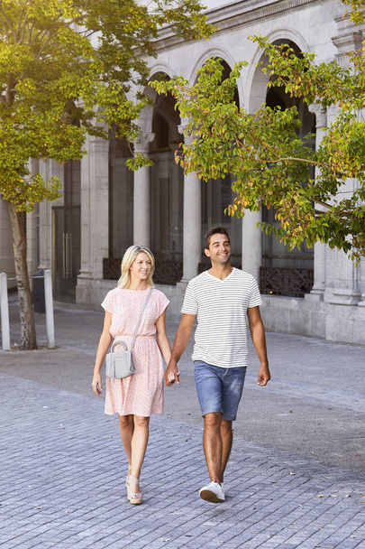 Happy couple walking - Фото, изображение