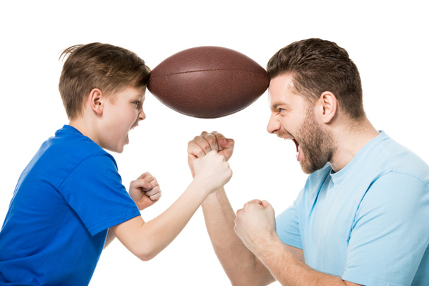 Père et fils avec ballon de rugby
 - Photo, image
