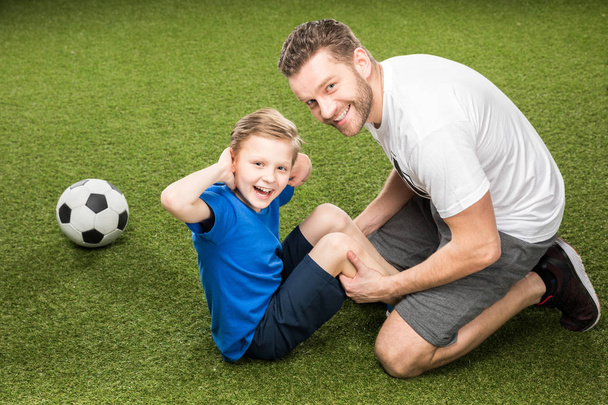 father and son training together - Foto, afbeelding