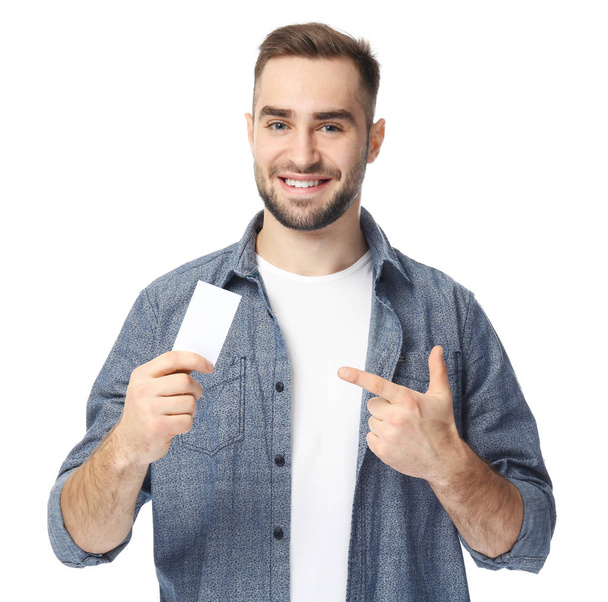 Handsome young man with business card   - Foto, Imagem