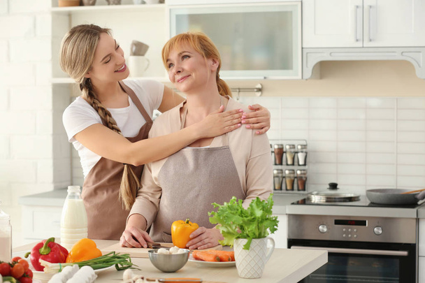 woman and mother cooking  - Photo, image