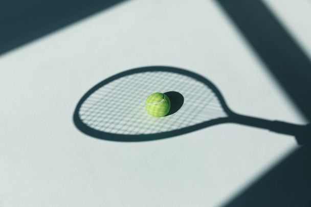 tennis racket and ball on floor  - Fotó, kép