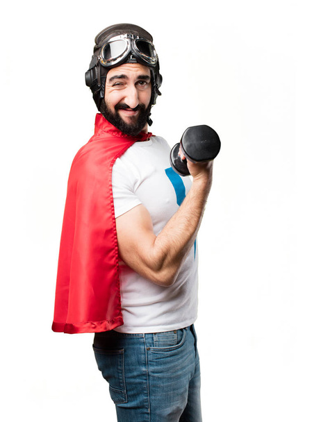 young super hero with a dumbbell - Foto, Imagem