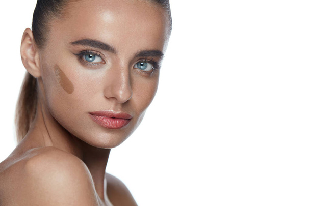 Beauty Woman Face. Young Female With Contouring Cream On Face - Fotografie, Obrázek