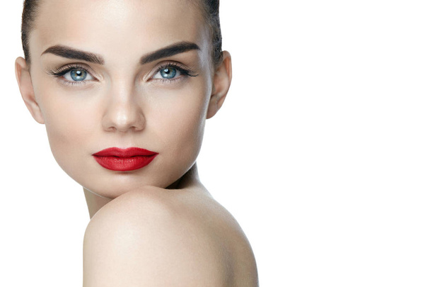 Fashion Makeup. Young Woman With Perfect Makeup And Red Lips - Фото, зображення