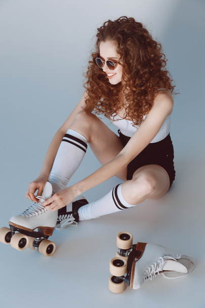 Hipster girl with roller skates  - Φωτογραφία, εικόνα