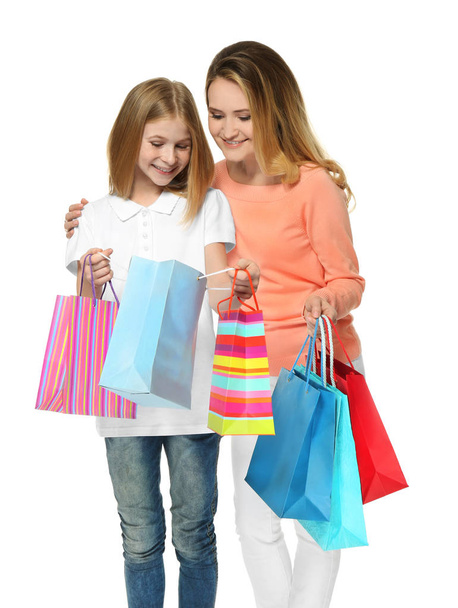 Mother and daughter with paper bags - Foto, Bild
