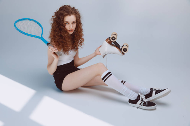 Young woman with racket  - Zdjęcie, obraz