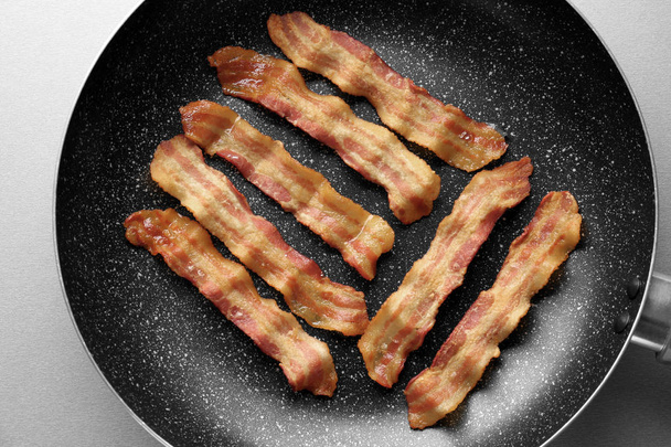 Pan with fried bacon  - Photo, Image