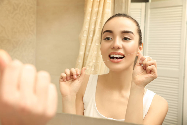 Beautiful woman brushing teeth  - Φωτογραφία, εικόνα