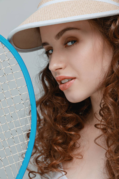 Young woman with racket  - Fotoğraf, Görsel