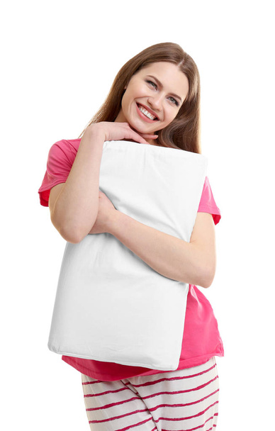 Young woman hugging orthopedic pillow  - Foto, Bild