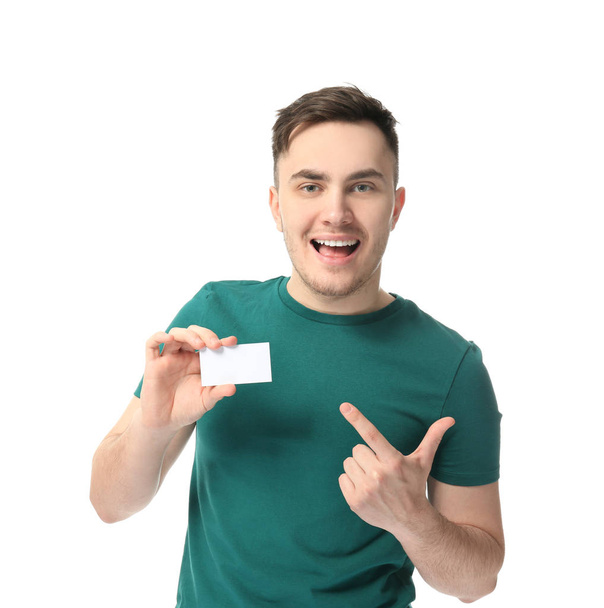 young man with business card - Фото, изображение