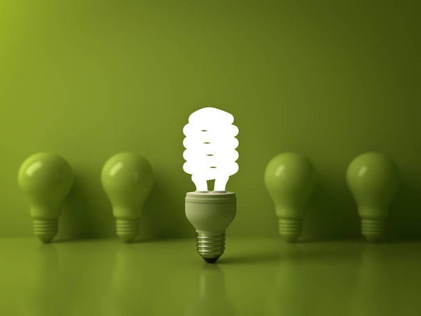 Eco energy saving light bulb , one glowing compact fluorescent lightbulb standing out from unlit incandescent bulbs reflection on green background , individuality and different concept . 3D render - Photo, Image