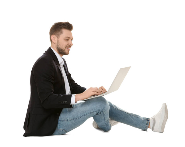 Handsome young man with laptop  - Foto, imagen