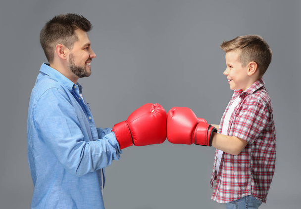 Father and son having boxing training  - Photo, image